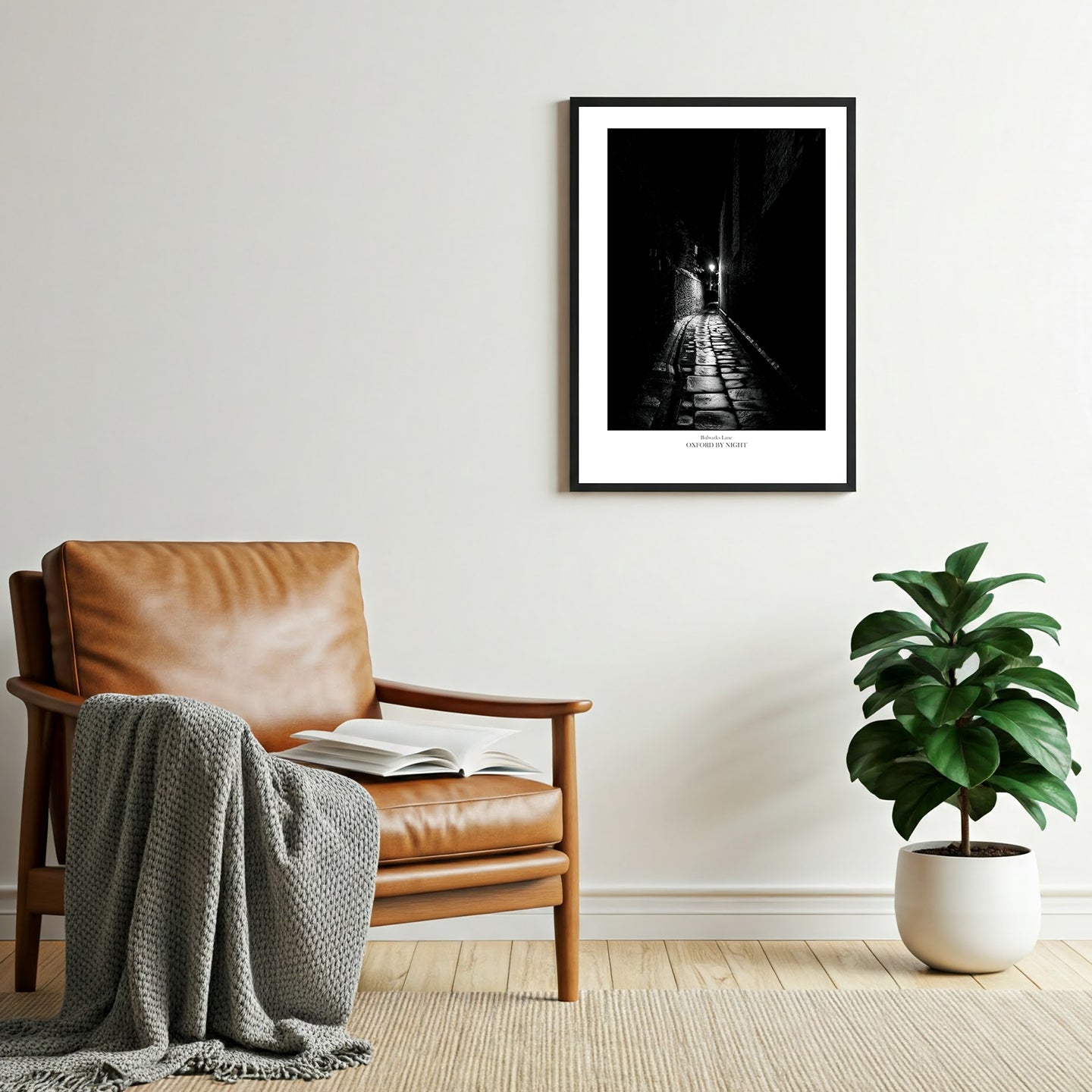 Relive the enchantment of your Oxford visit with this evocative and eerie black and white photographic wall art print of the narrow cobbles of Bulwarks lane.