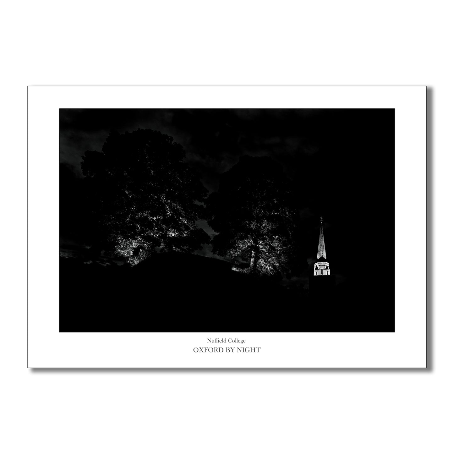 Evocative B&W art print showcasing the trees on top of Oxford Castle Mound and Nuffield college tower under the cover of darkness.