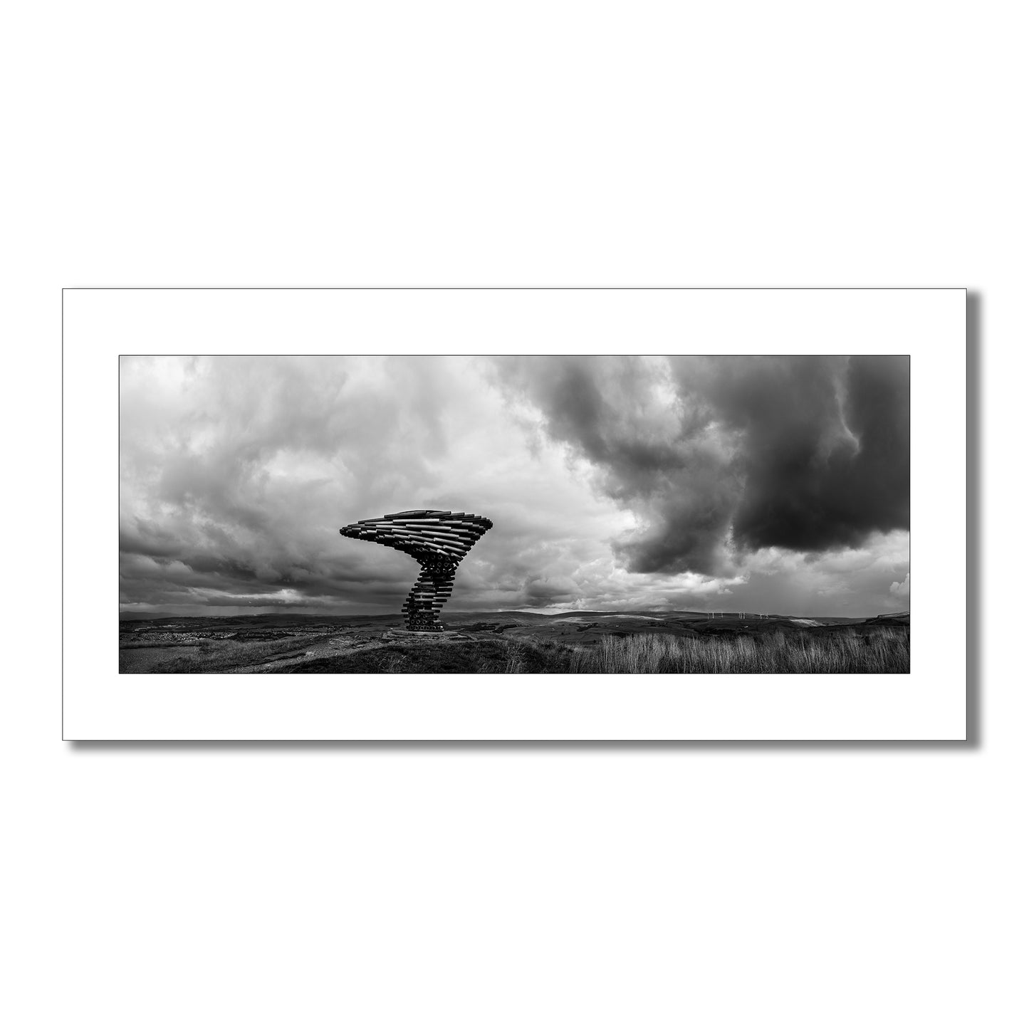 Dramatic Black and white art print featuring the Singing Ringing Tree sculpture in the Pennine Hills