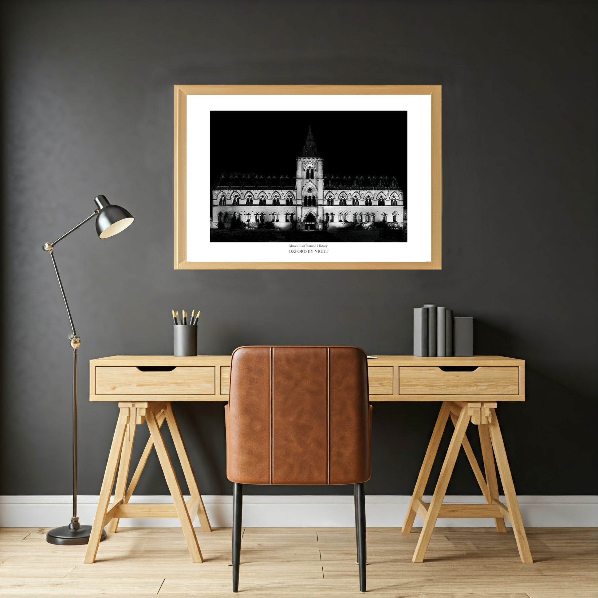 Exclusive B&W wall art print showcasing the Oxford University Museum of Natural History under the cover of darkness. A mesmerizing black and white image highlighting the unique architecture of this historic museum
