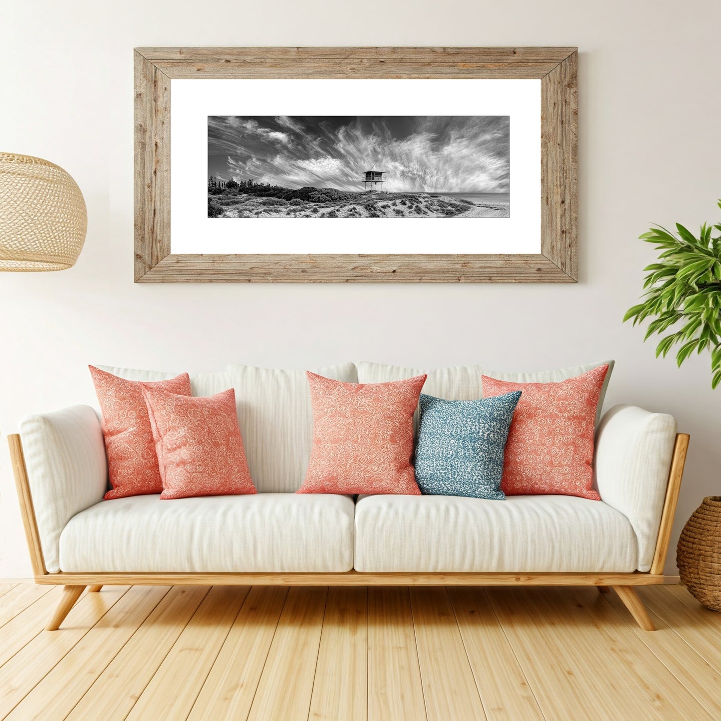 Escape to the coast with this breathtaking black and white panorama  wall art print of Semaphore Beach, Australia. Featuring a historic lookout tower and awe-inspiring clouds, this limited-edition print is a must-have for any art lover or traveller